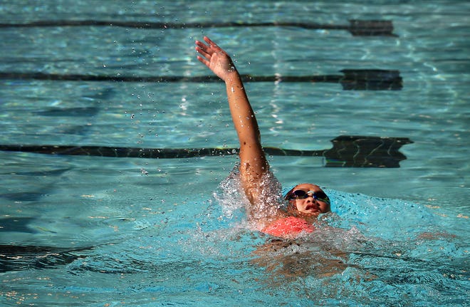 Galena junior Emma Karam does the backstroke in the Idlewild Pool in Reno on May 5, 2021. Karam has qualified for the Olympic Trials this summer.