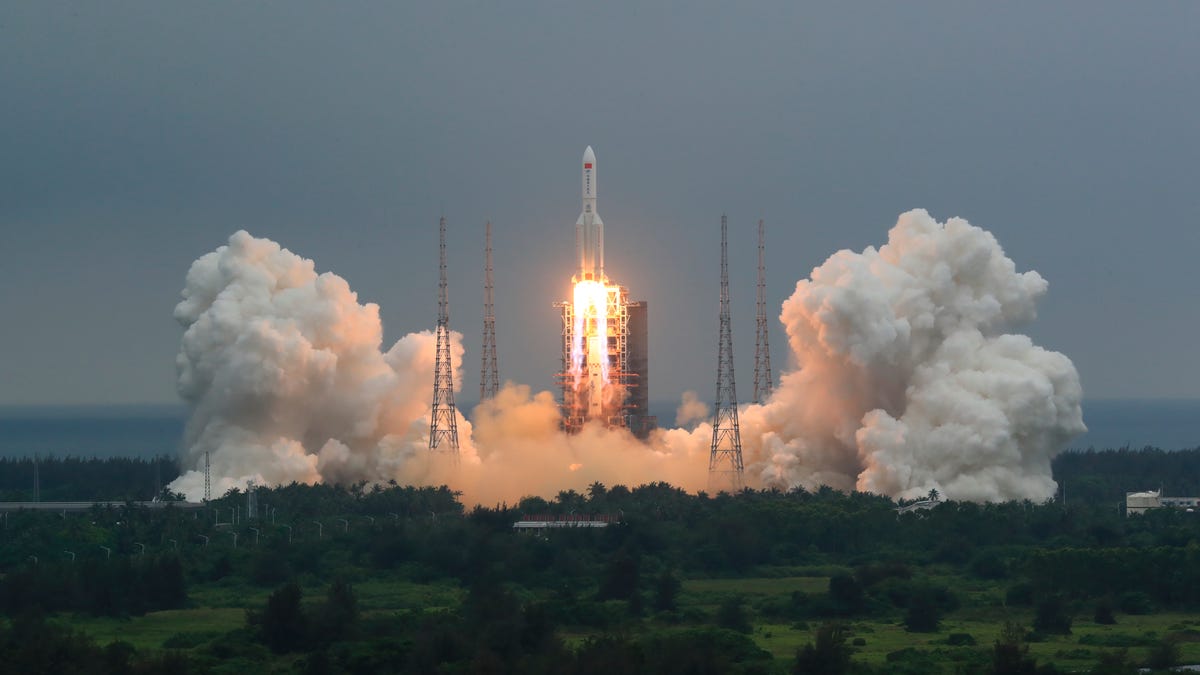 In this April 29, 2021, file photo released by China's Xinhua News Agency, a Long March 5B rocket carrying a module for a Chinese space station lifts off from the Wenchang Spacecraft Launch Site in Wenchang in southern China's Hainan Province. The central rocket segment that launched the 22.5-ton core of China's newest space station into orbit is due to plunge back to Earth as early as Saturday in an unknown location.