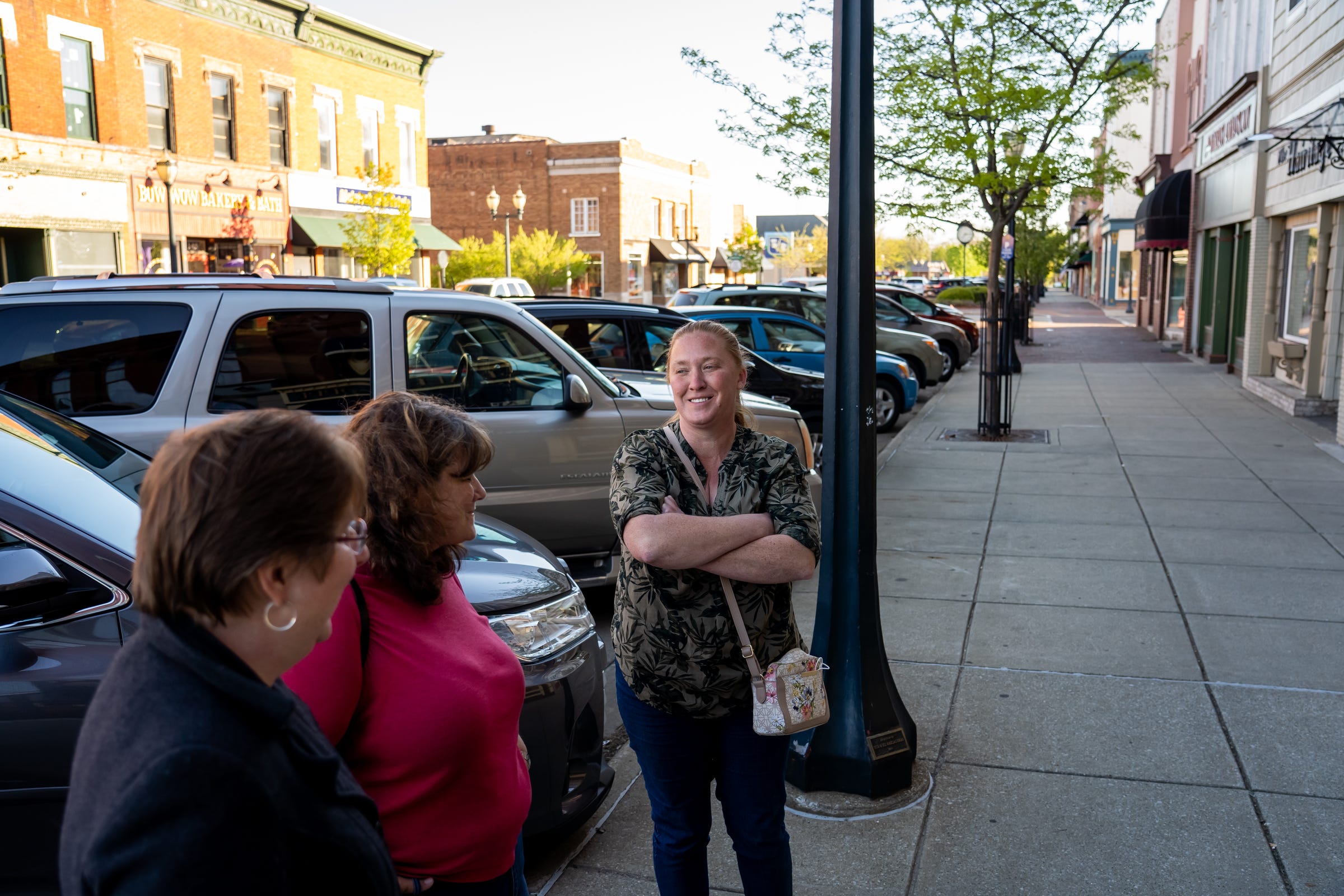 (Right to left) Monica Eastridge, Kim Weldy, 51, of Dowagiac and Stacy Ritchie, 51, of South Haven talk about the COVID vaccines after having dinner together at a restaurant in downtown Dowagiac on Wednesday, May 5, 2021. Eastridge had her first vaccination shot earlier in the day along with her 16-year-old daughter. Weldy, who works in medical billing, has been fully vaccinated and Ritchie has not decided to be vaccinated.