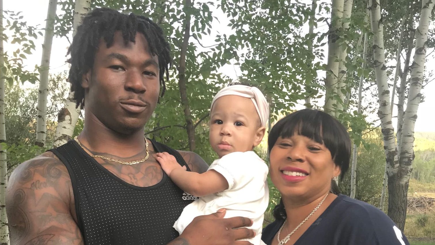 Jamaal Williams with his mother Nicolle Thompson-Williams and his daughter Kalea.