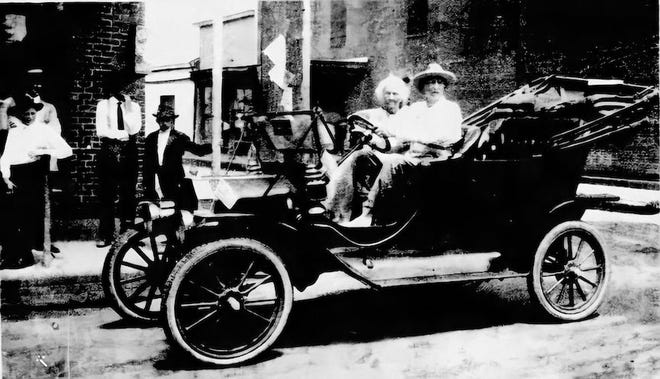 111-year-old Auguste Jeansonne and his 92-year-old daughter Celenia (Mrs. Jean Batiste Fruge) in the Ford car he drove in the 1922 Ford Day Parade in Opelousas.