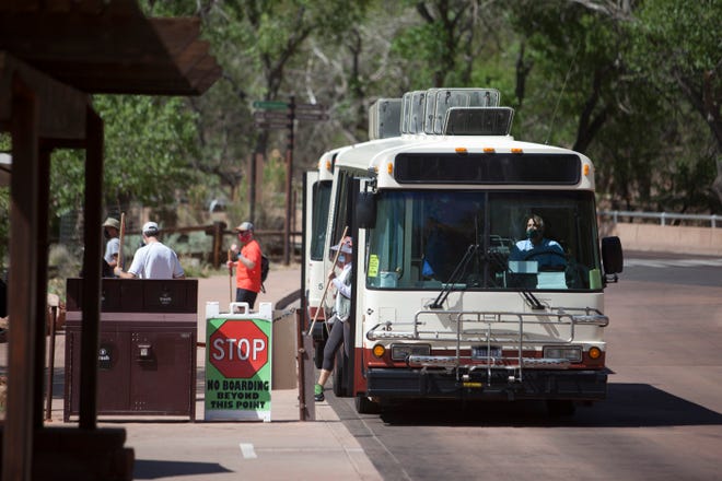 Zion National Park shuttles transport visitors through the park Thursday, May 6, 2021. 