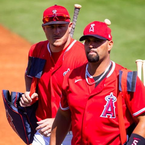 Mike Trout, left, and Albert Pujols during a March
