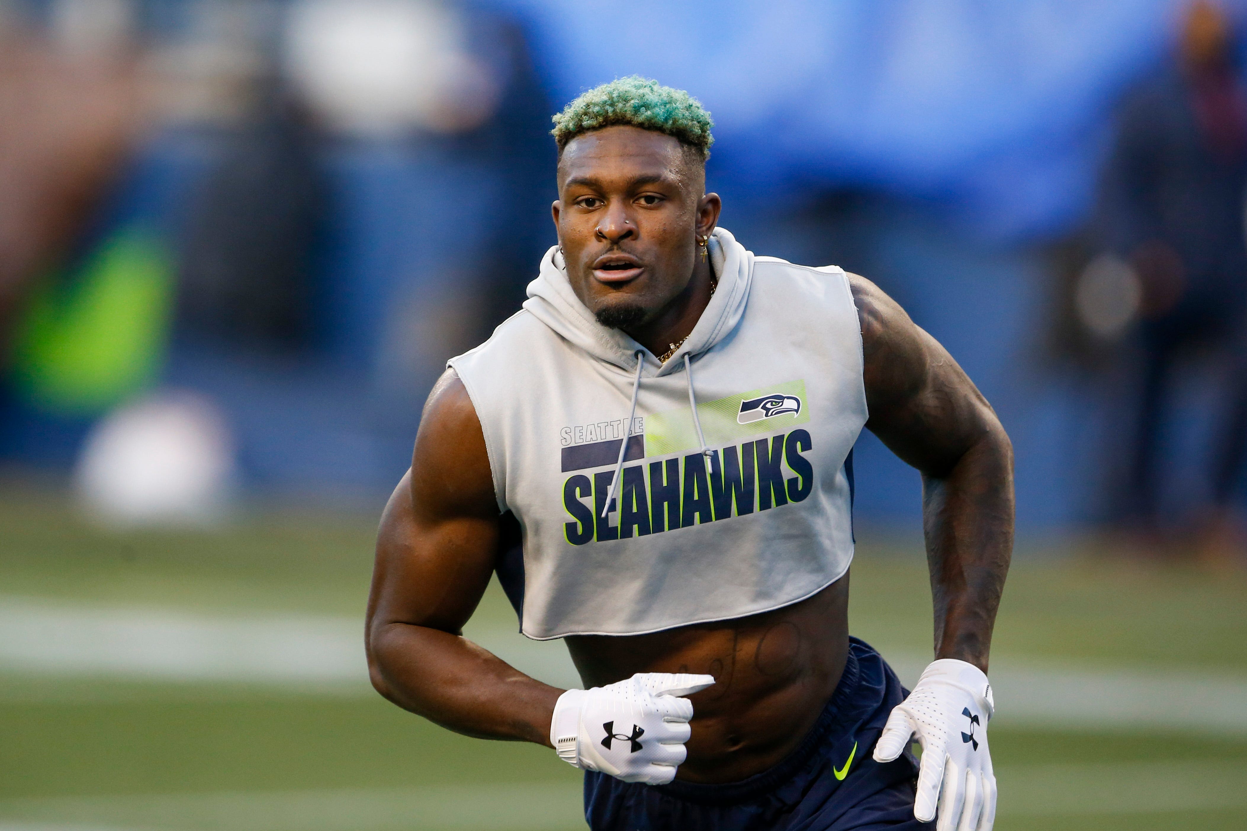 DK Metcalf keeps pace with Olympic-caliber sprinters in track debut