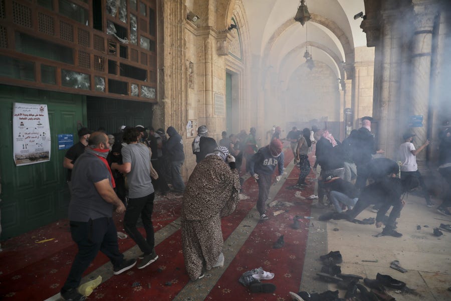 Israeli police fire tear gas at Palestinians at the Al-Aqsa Mosque compound in Jerusalem's Old City on May 10.