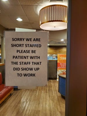 Restaurants throughout the metro area are warning customers of longer waits due to staffing shortages.