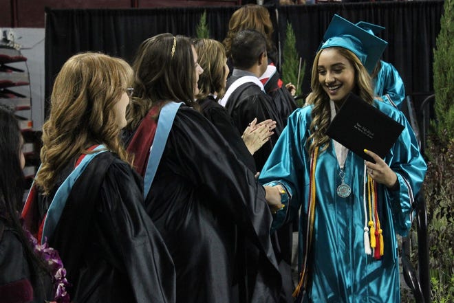Seniors at Oñate High School received their diplomas at the Pan American Center in 2019. After the COVID-19 pandemic cancelled graduation ceremonies at the Pan Am in 2020, in-person graduations will return for the Class of 2021 at the Field of Dreams.