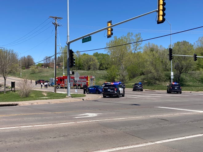 Police work the scene of a car-pedestrian crash at Sixth Street and N. Cleveland Avenue on May 11, 2021.