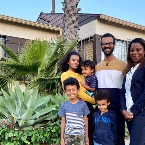 Yoni and Meaza Kebede with their children and thei