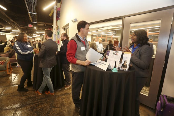 Bounce Innovation Hub will host its third annual Startup Showcase on Sept. 30. Here, Tiffany Adjei, right, the owner of Honesty Healthcare in Akron, speaks to Chris Keller of Beachwood about her business during the Inaugural Startup Showcase in November 2019 in Akron.