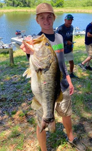 Kody Glass, 16, took big bass with this 9.19 pounder to help him and his father Derek Glass to a total weight of 15.07 pounds to win second place during the Performance Bass Anglers tournament May 8 on Lake Toho.