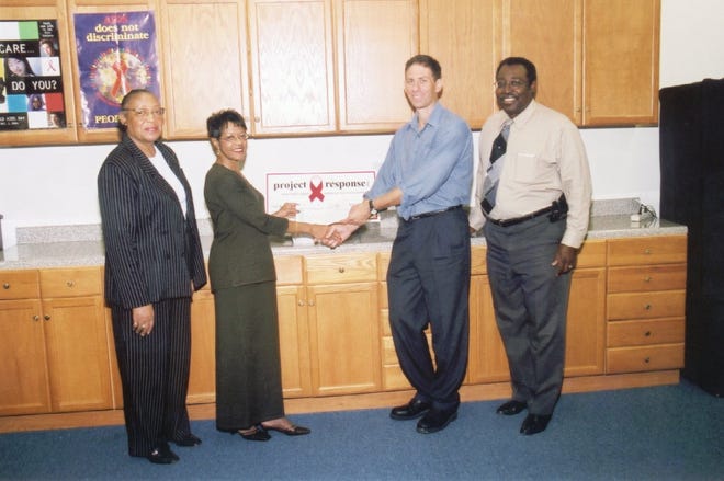 Split Frink and others in an undated photo about Project Response, an HIV awareness campaign.