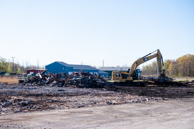 Crews work to demolish the railroad roundhouse near 32nd and Petit streets in Port Huron Township. CSX has decided to demolish the structure due to safety concerns.