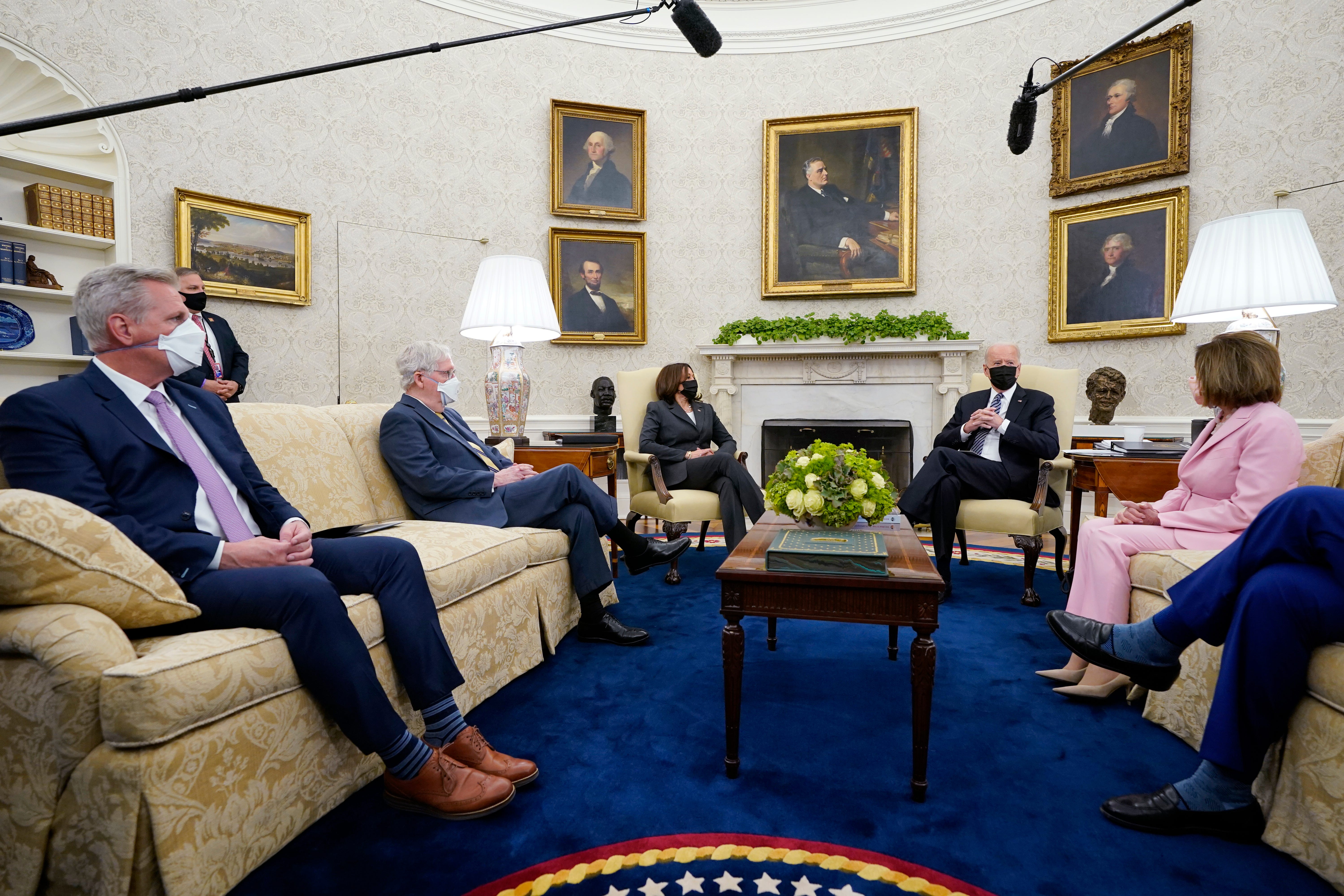 President Joe Biden and Vice President Kamala Harris meet on May 12 with congressional leaders, from left, House Minority Leader Kevin McCarthy, R-Calif.; Senate Minority Leader Mitch McConnell, R-Ky.; House Speaker Nancy Pelosi, D-Calif.; and Senate Majority Leader Chuck Schumer, D-N.Y.