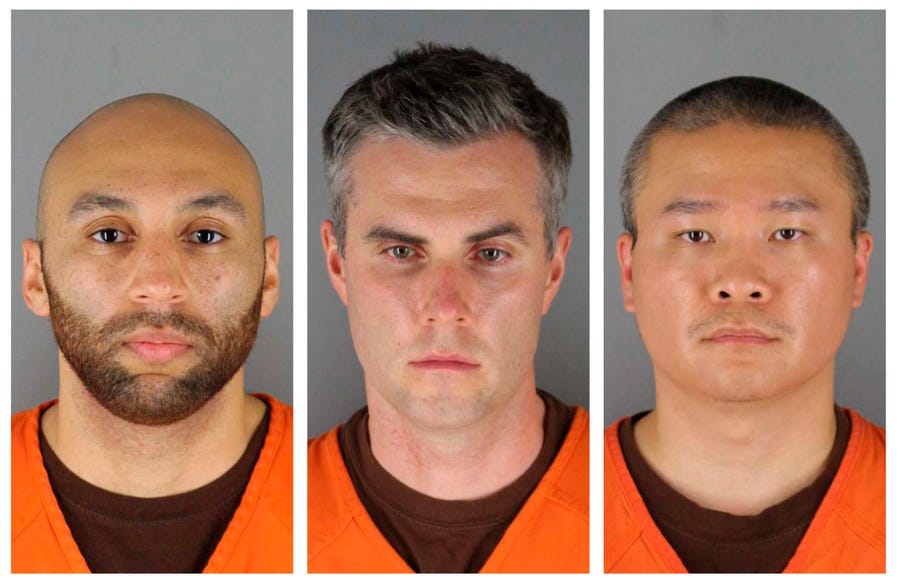 Former Minneapolis police officers, from left, J. Kueng, Thomas Lane and Tou Thao are scheduled to stand trial in March 2022 in the death of George Floyd.