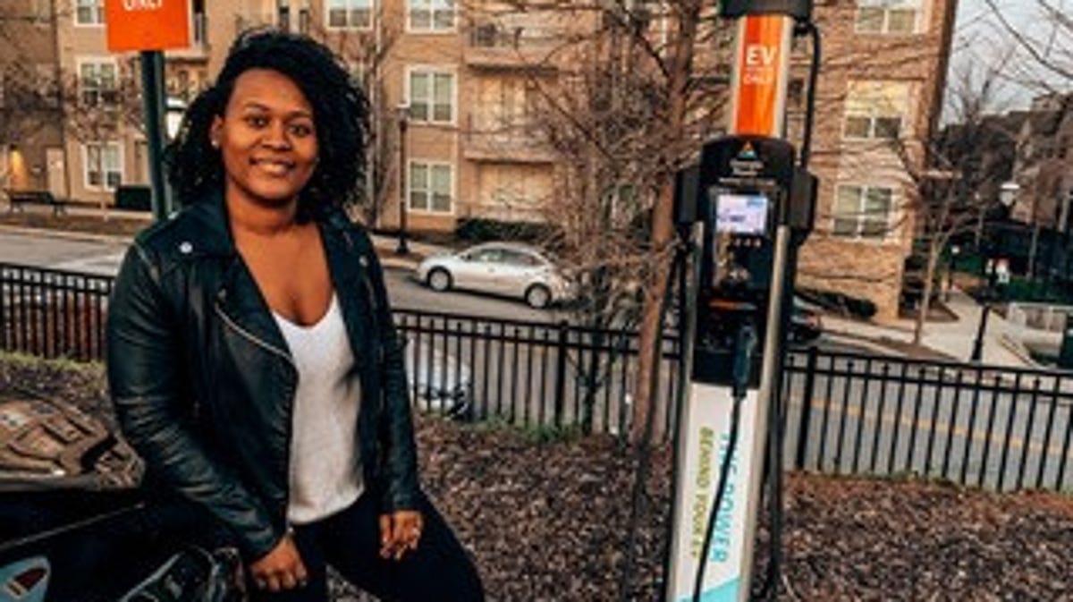 Atlanta resident Brittany Idleburg charges her Tesla Model S electric car.