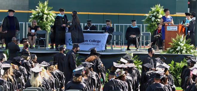 Graduates received their diplomas during the Gaston College Commencement program Friday morning, May 14, 2021, at FUSE District Stadium.