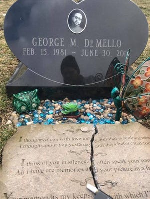 This is what the gravesite of George DeMello looked like before New Bedford cemetery workers removed items placed by his friend Patrick Hogan.