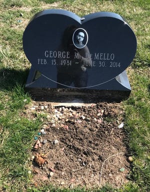 The gravesite of George DeMello in Rural Cemetery, where the items placed by his friend Patrick Hogan were removed by New Bedford cemetery workers.
