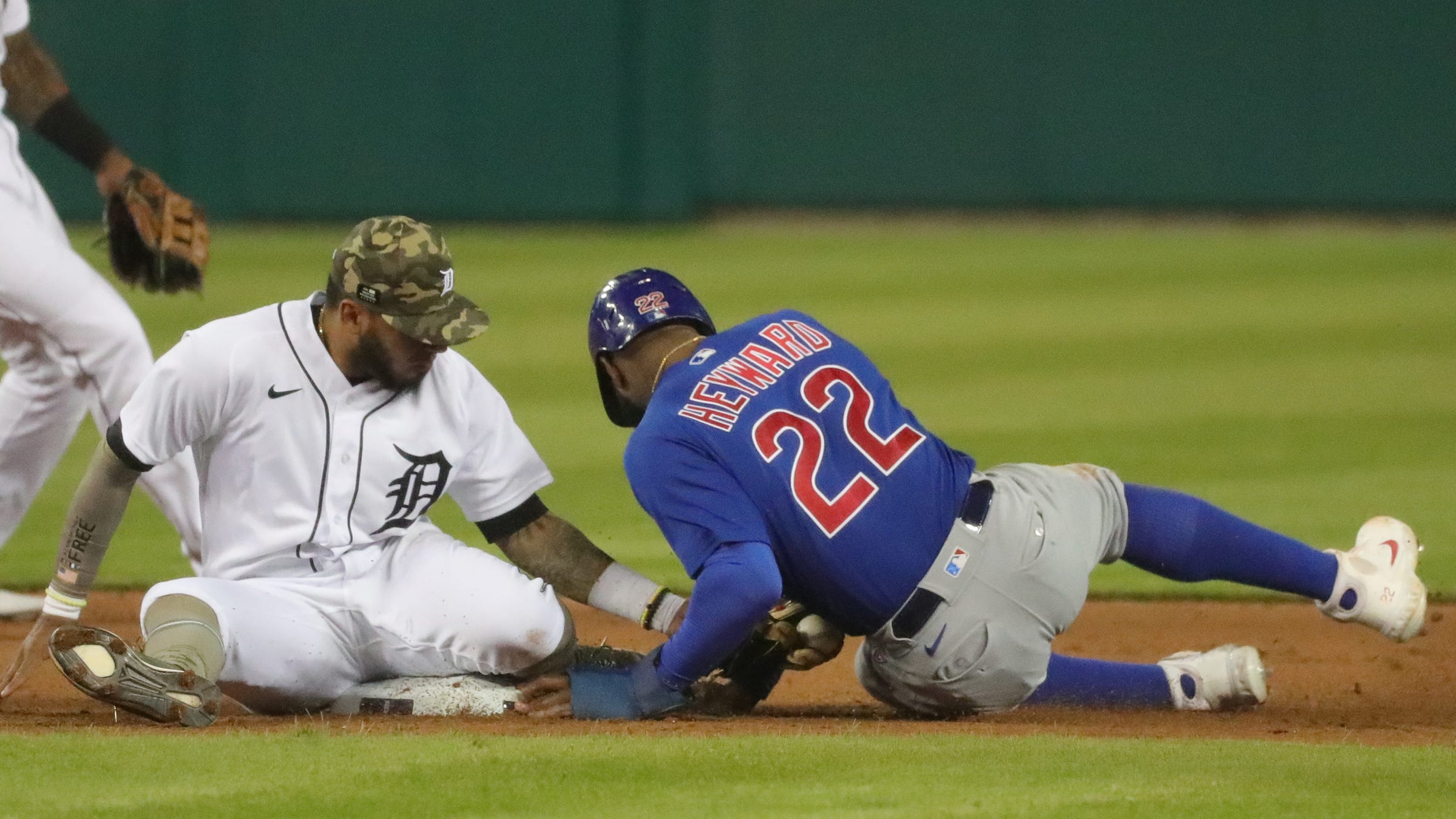 Tigers second baseman Harold Castro tags out Cubs right fielder Jason Heyward during the ninth inning of the Tigers' 4-2 loss on Friday, May 14, 2021, at Comerica Park.