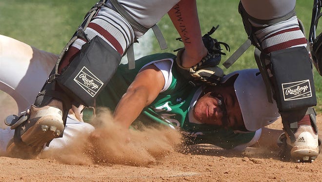 Korbin Covarrubiaz is tagged out at home plate for Eldorado during a game against Hawley on Friday, May 14, 2021.