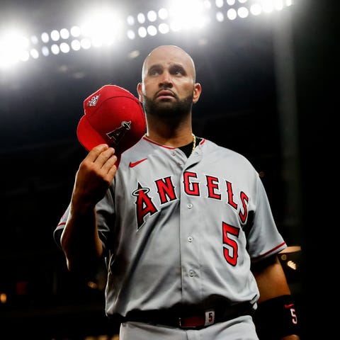 Pujols won World Series titles with the Cardinals 