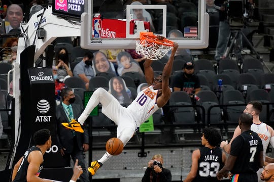 May 16, 2021; San Antonio, Texas, USA; Phoenix Suns forward Jalen Smith (10) dunks in the third quarter against the San Antonio Spurs at AT&T Center. Mandatory Credit: Scott Wachter-USA TODAY Sports