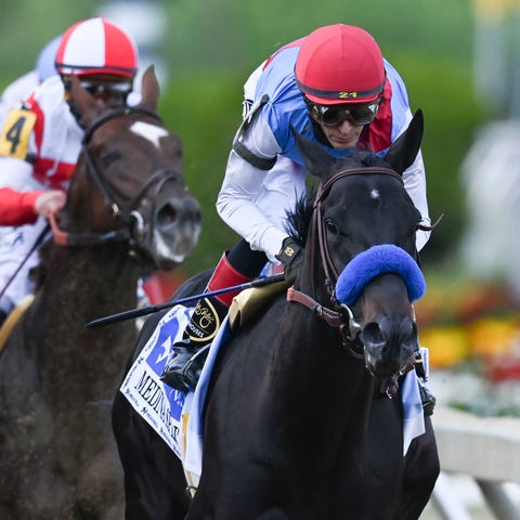 Jockey John Velazquez aboard Medina Spirit during 