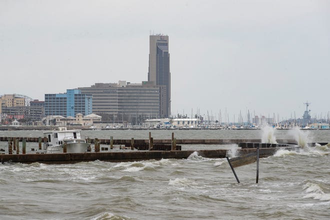 Waves crash in to a seawall in Corpus Christi Bay on Monday, May, 17, 2021.