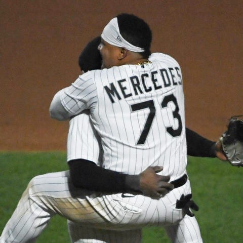 Tim Anderson and Yermin Mercedes celebrate a White