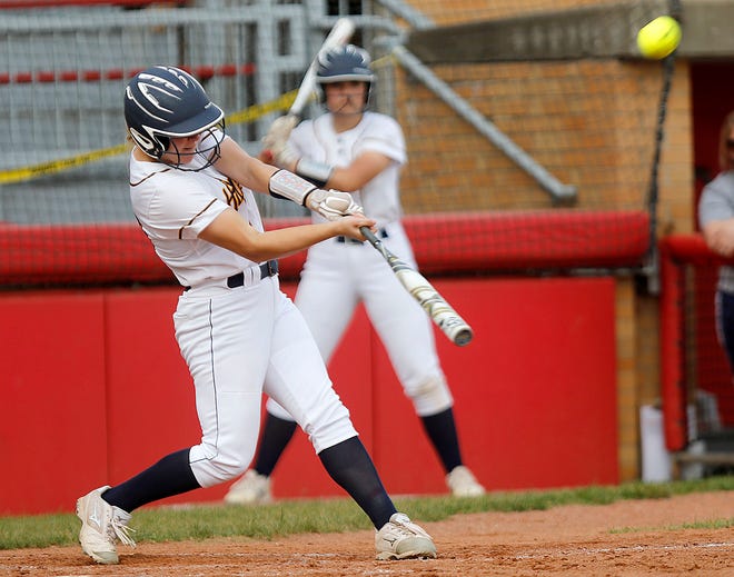 Hillsdale High School’s Bryn Grabowski (20) connects with a pitch for a two-run home run off of Mogadore High School pitcher Madison King in the fourth inning during their OHSAA Division IV district semifinal softball game Monday, May 17, 2021 at Firestone Stadium in Akron. Mogadore won the game 7-5. TOM E. PUSKAR/TIMES-GAZETTE.COM