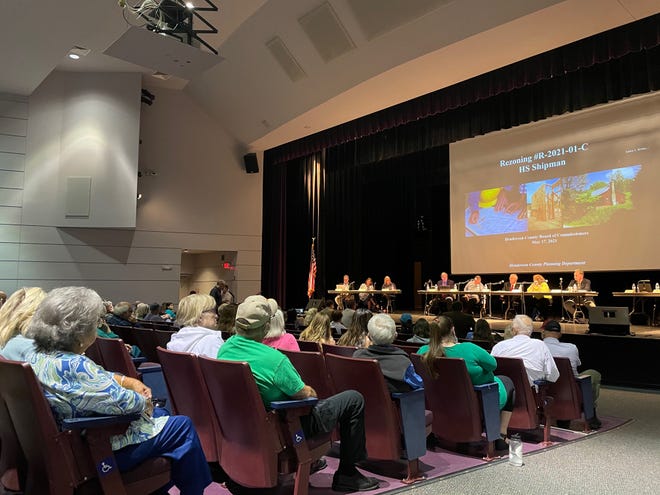 The Thomas Audtiorium at Blue Ridge Community College was nearly full Monday for a public hearing on a proposed asphalt plant in East Flat Rock.