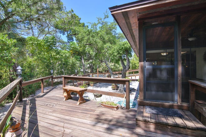 Myra and Paul Steinberg chose a heavily wooded lot for their Siesta Key home, and removed as few trees as possible to accommodate the construction, their son Bruce recalled.