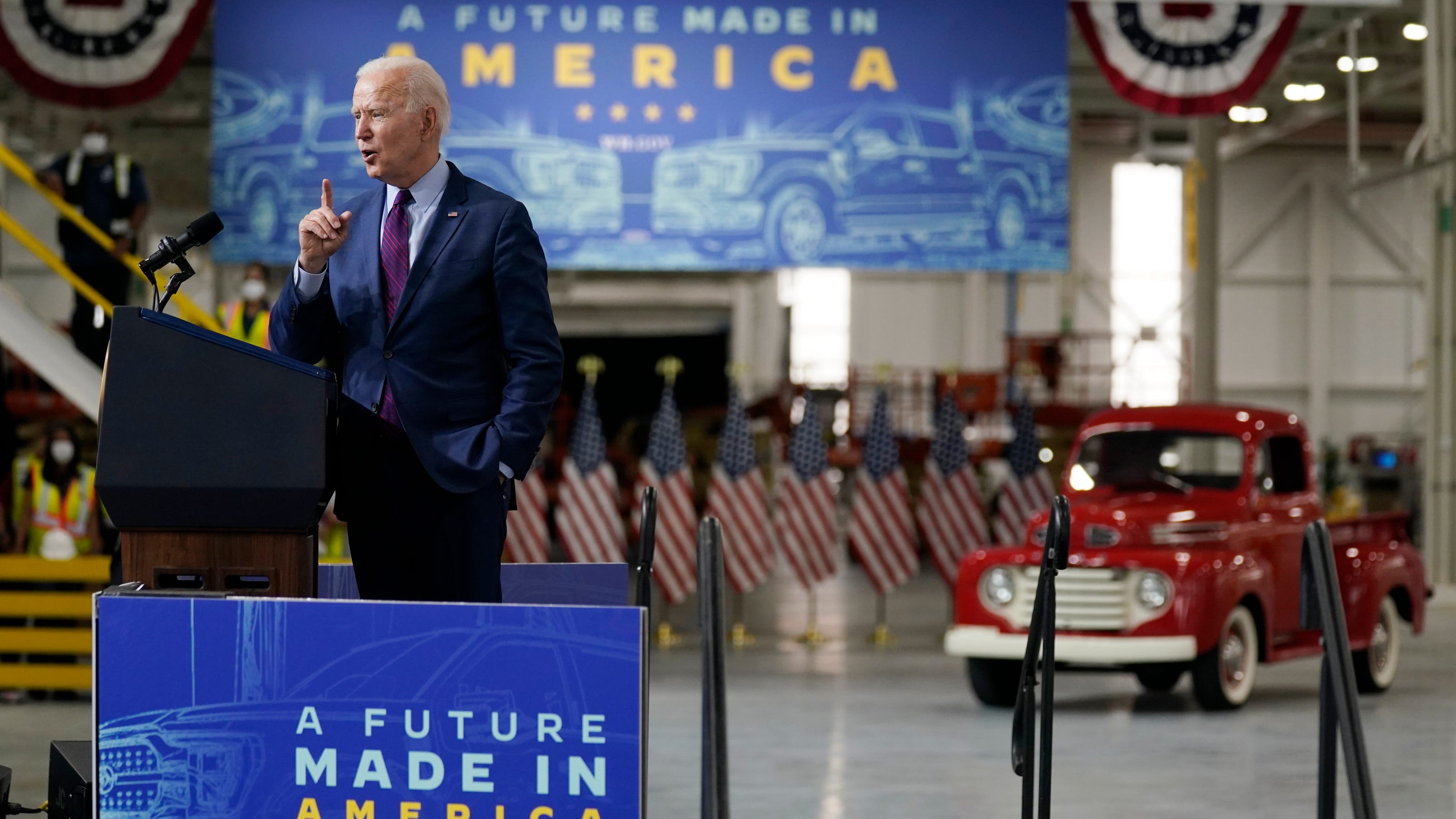 Biden visits Ford, criticizes Trump for delaying electric vehicles