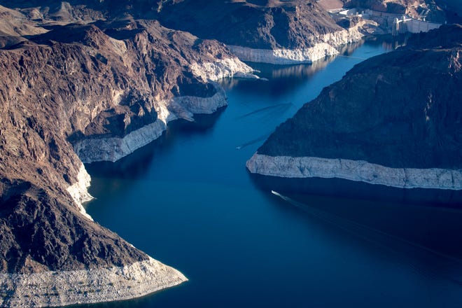 Hoover Dam (top right) and Lake Mead, May 11, 2021, on the Arizona/Nevada border. A high-water mark or bathtub ring is visible on the shoreline.