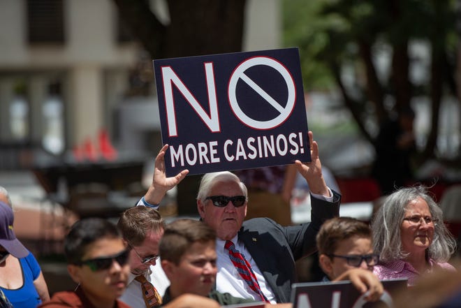 Around 200 people gathered for a rally against gambling expansion in Florida in the Capitol courtyard in Tallahassee Tuesday, May 18, 2021.
