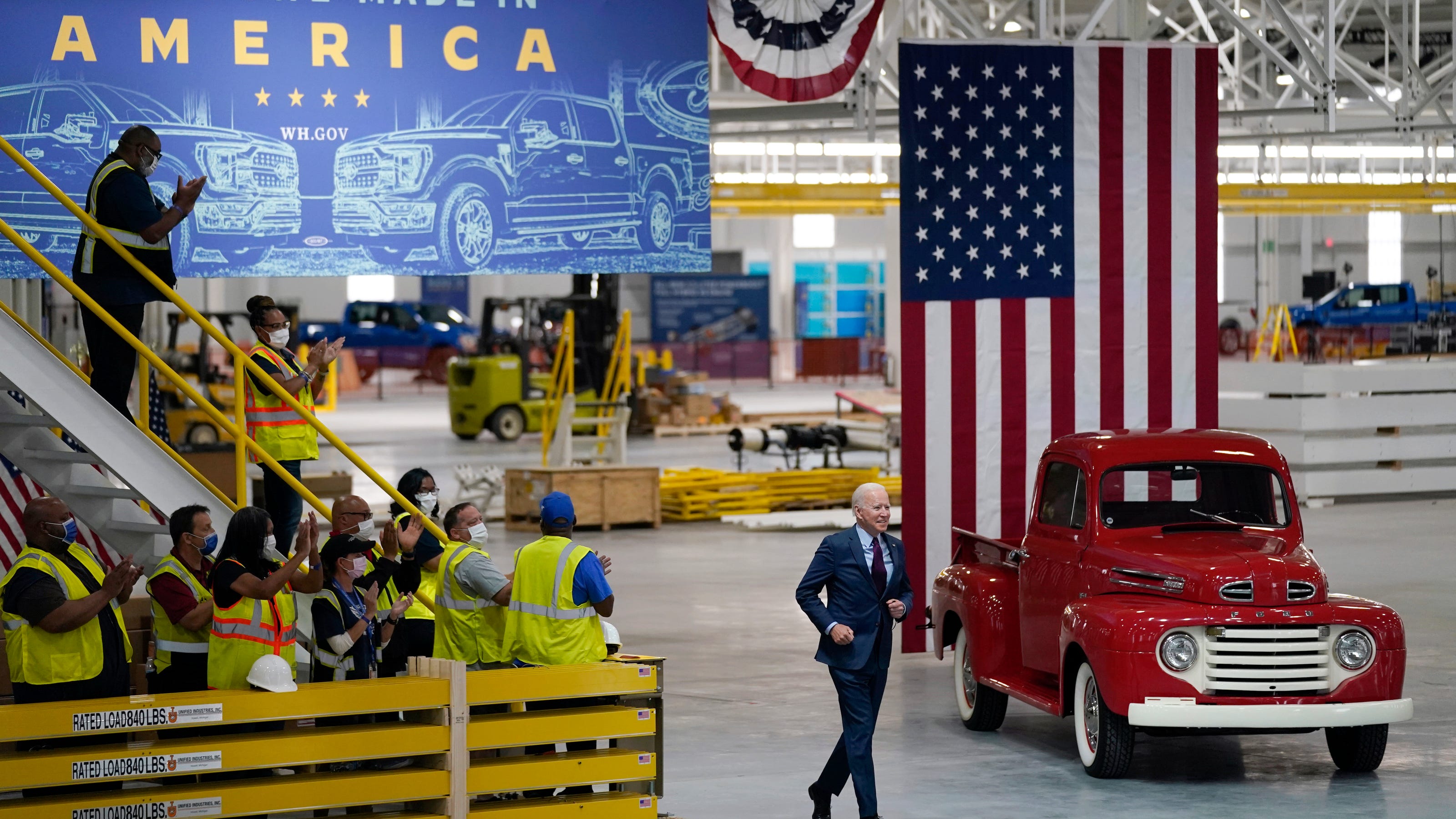 President Biden goes fast as he test drives new electric Ford truck