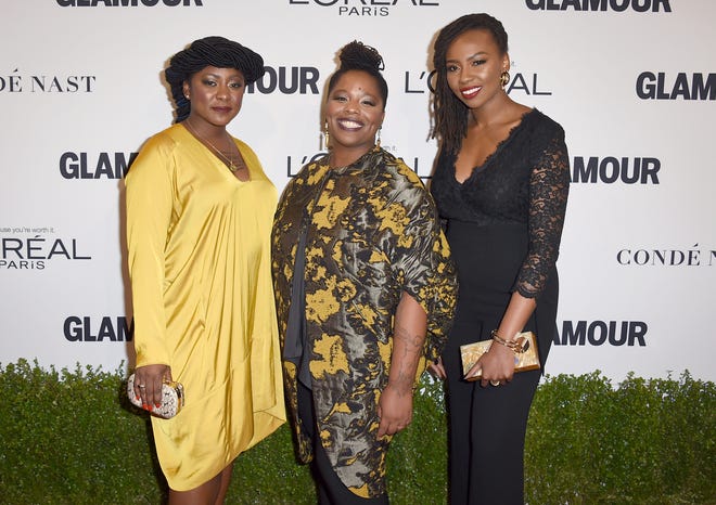 Alicia Garza, from left, Patrisse Cullors and Opal Tometi, co-founders of the Black Lives Matter movement, arrive at the Glamour Women of the Year Awards at NeueHouse Hollywood on Monday, Nov. 14, 2016, in Los Angeles.