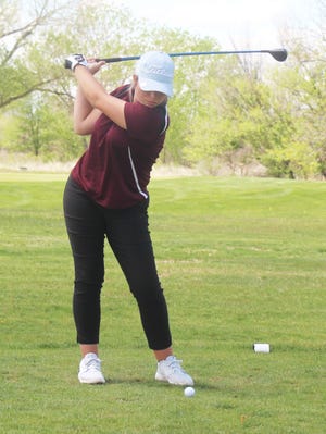 Swink High School's Kinzie Ensor drives from the eighth tee at the Fowler Invitational on May 18, 2021, at the Cottonwood Links. Ensor was the individual medalist and she led the Lions to a second place finish.