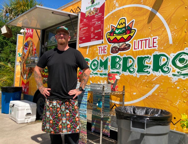 Carlos Davidson stands in front of The Little Sombrero food truck at The Village Garden Food Truck Park near St. Augustine Beach on Tuesday. Davidson and his business partners recently launched the operation, which offers a Southern California take on Mexican street food.