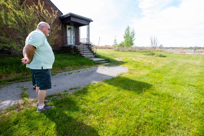 Clay Township Supervisor Artie Bryson talks about the property for the county's beachfront park Wednesday, May 19, 2021. St. Clair County received a $1.4 million grant from the state to buy the property.