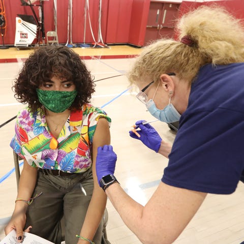 Nyack High School student Emma Dorpe gets a COVID-