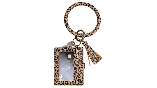 This wristlet comes with a fashionable bangle keychain.