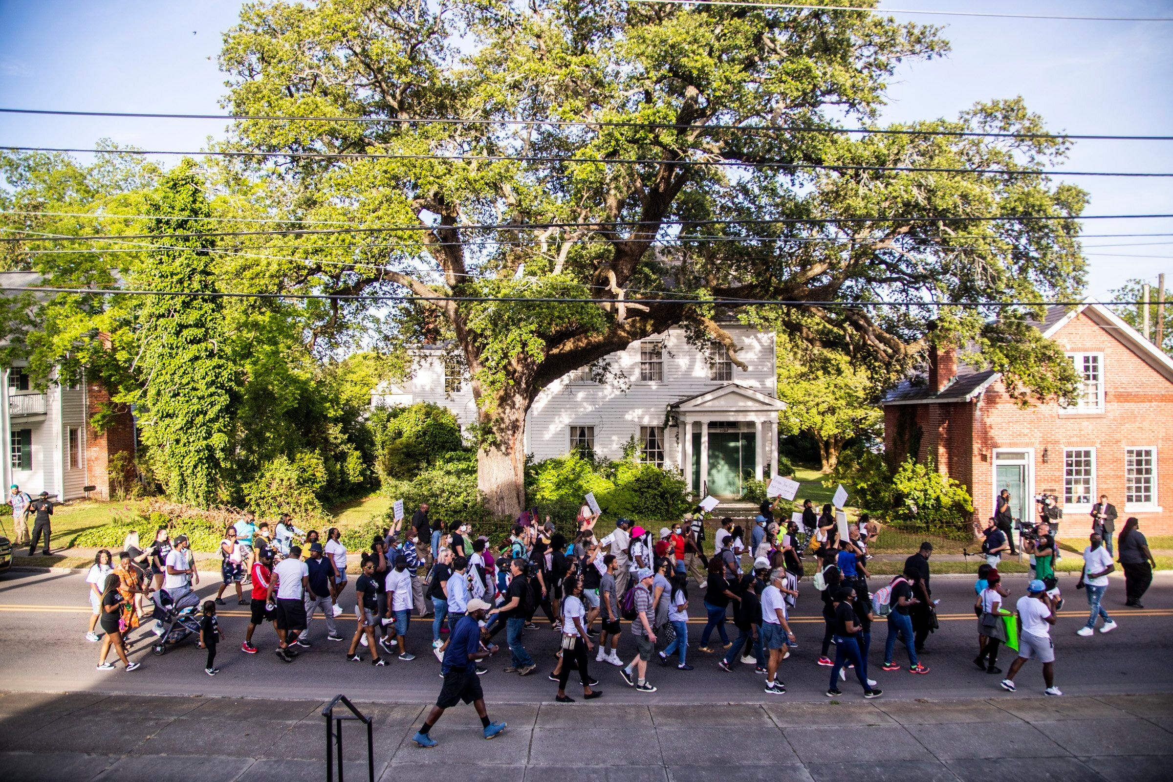 Demonstrators march in Elizabeth City, N.C. Tuesday, May 18, 2021 after Pasquotank County District Attorney Andrew Womble announced he will not charge deputies in the April 21 fatal shooting of Andrew Brown Jr.