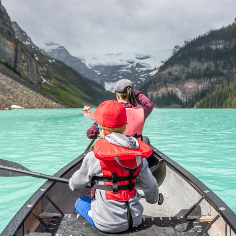 POV Family canoeing at Lake Louise  in Banff Natio