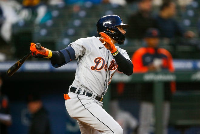 Detroit Tigers batter Harold Castro hits a two-run single against the Seattle Mariners during the fourth inning at T-Mobile Park in Seattle, May 19, 2021.