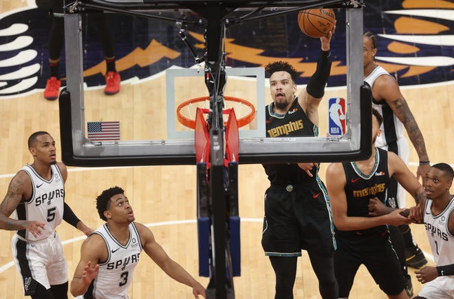 Memphis Grizzlies guard Dillon Brooks lays the ball up against the San Antonio Spurs during their play-in tournament game at the FedExForum on Wednesday, May 19, 2021.