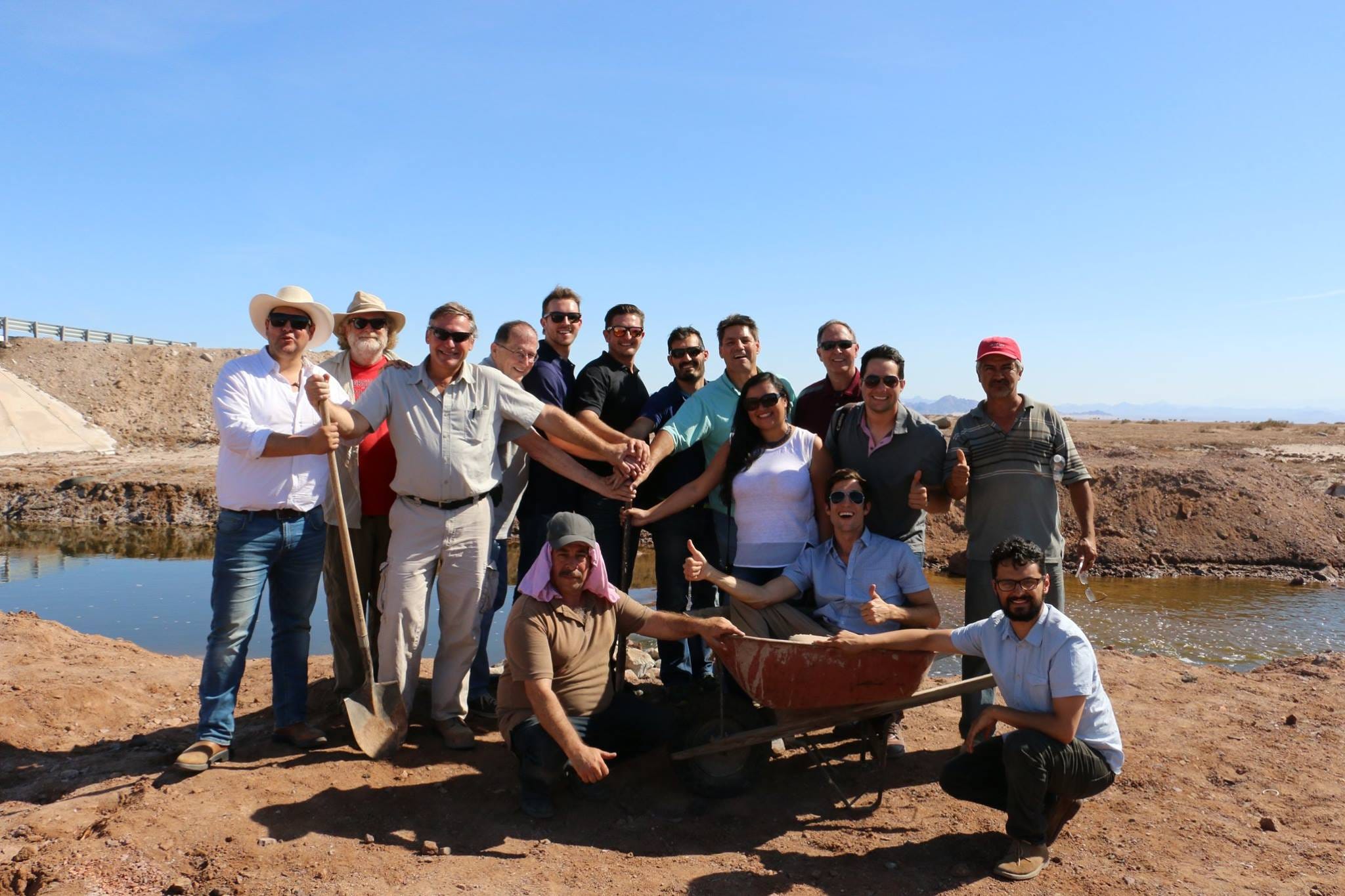 Engineers and advocates for a sea-to-sea solution tour the Coyote Canal in 2014.