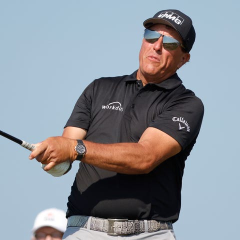 Phil Mickelson hits from the 15th tee box during t