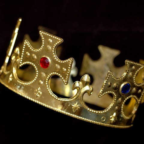 A plastic crown with jewels.